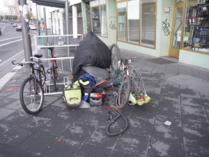 In Francfort , after more than 8000 km, I got my first flat tyre... I repair in the street.