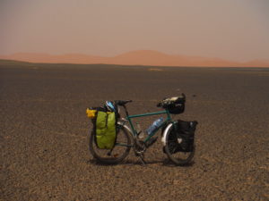 The surface of the soil is covered of metallic concessions - Merzouga