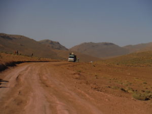 A truck, stops along the trail to trade with the nomads.