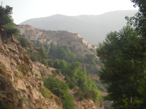 The village Toufine, this size of the mountains is more green, there are trees...